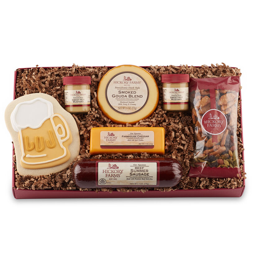 Father's Day Cravings Assortment includes Signature Beef Summer Sausage, Smoked Gouda Blend, Farmhouse Cheddar, Cranberry & Sesame Nut Mix, Sweet Hot Mustard, and a beer stein cookie.