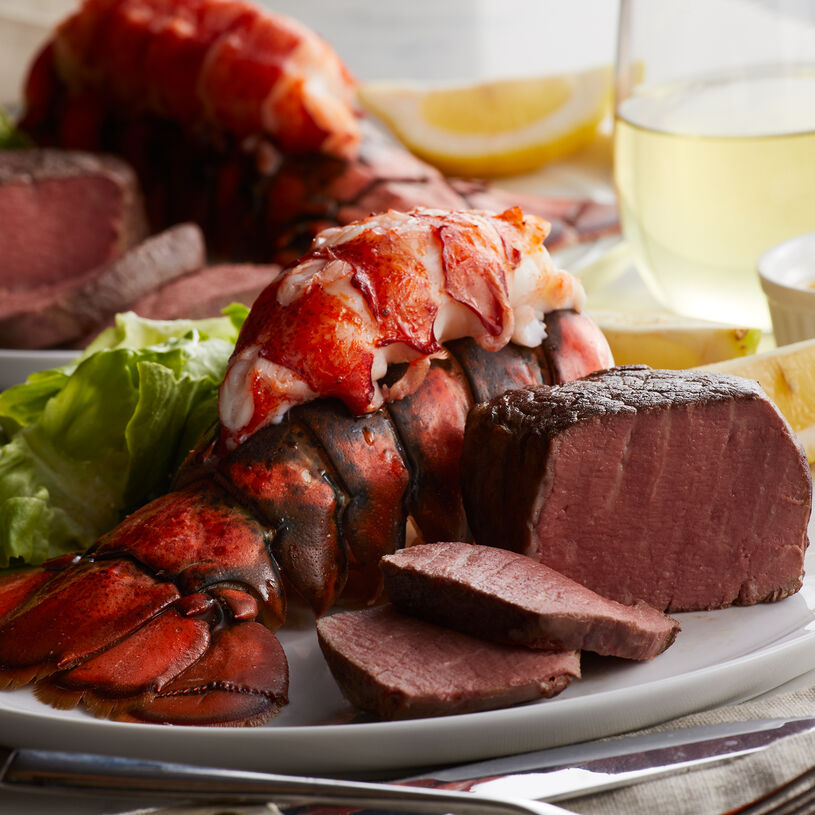 Perfectly tender Filet Mignon steaks are matched with our sweet, succulent lobster tails. 