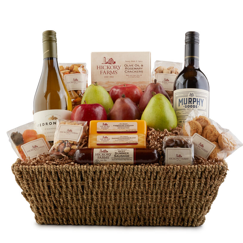 Holiday Celebration Gift Basket includes summer sausage, cheese, mixed nuts, and dried fruit