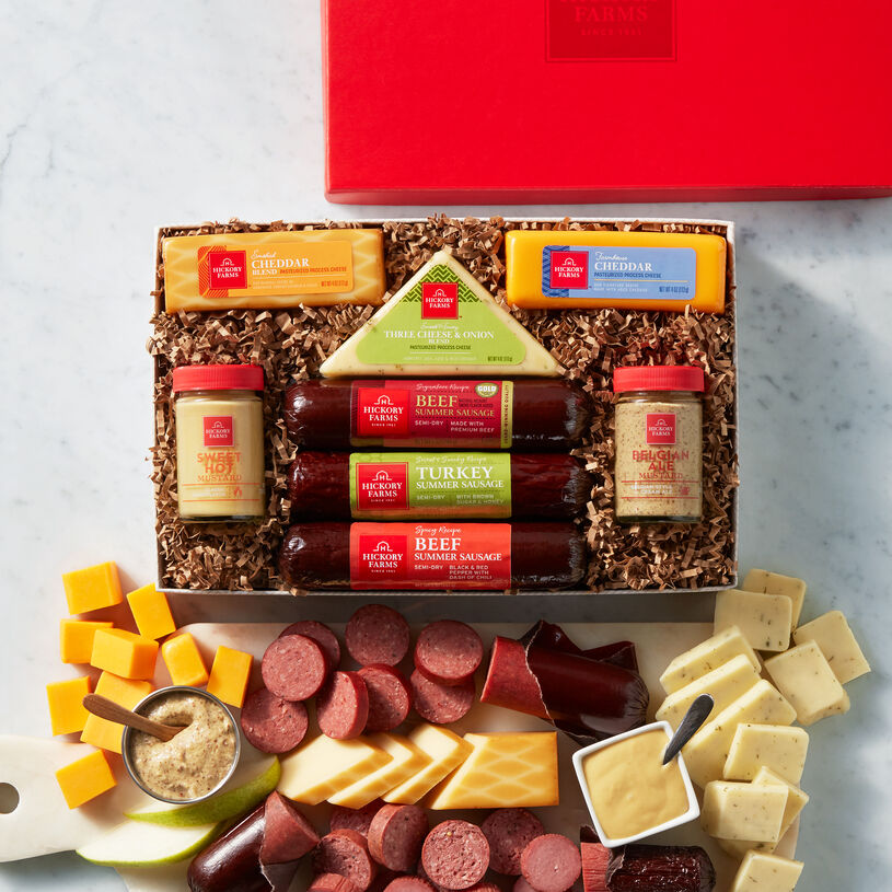 Hearty Bites gift box includes sausage, cheese, mustard, and various cheeses.