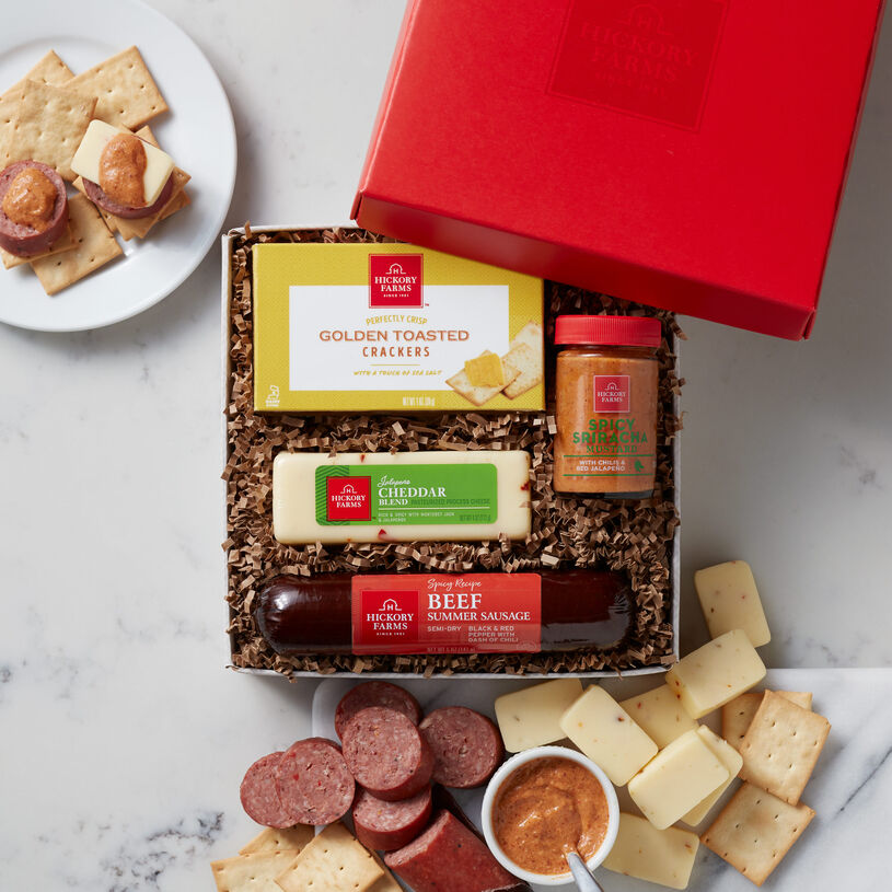 Spicy beef sampler includes spicy & savory beef summer sausage, jalapeno & cheddar cheese, crackers, and mustard