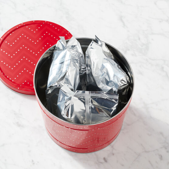 Bags of popcorn within the tin.