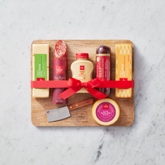 This set features our delicious signature flavors wrapped with a stylish board and cheese cleaver for an instant meat and cheese spread!