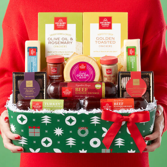 Here Comes Cheer Holiday Gift Basket Held by Woman