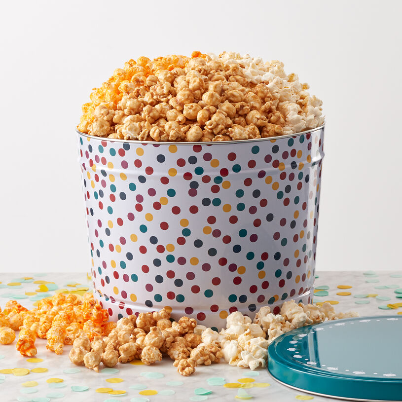 This tin is packed with a delectable sampling of Sweet & Salty Kettle Corn, Premium Caramel Corn, and White Cheddar Popcorn that's perfect for sharing.