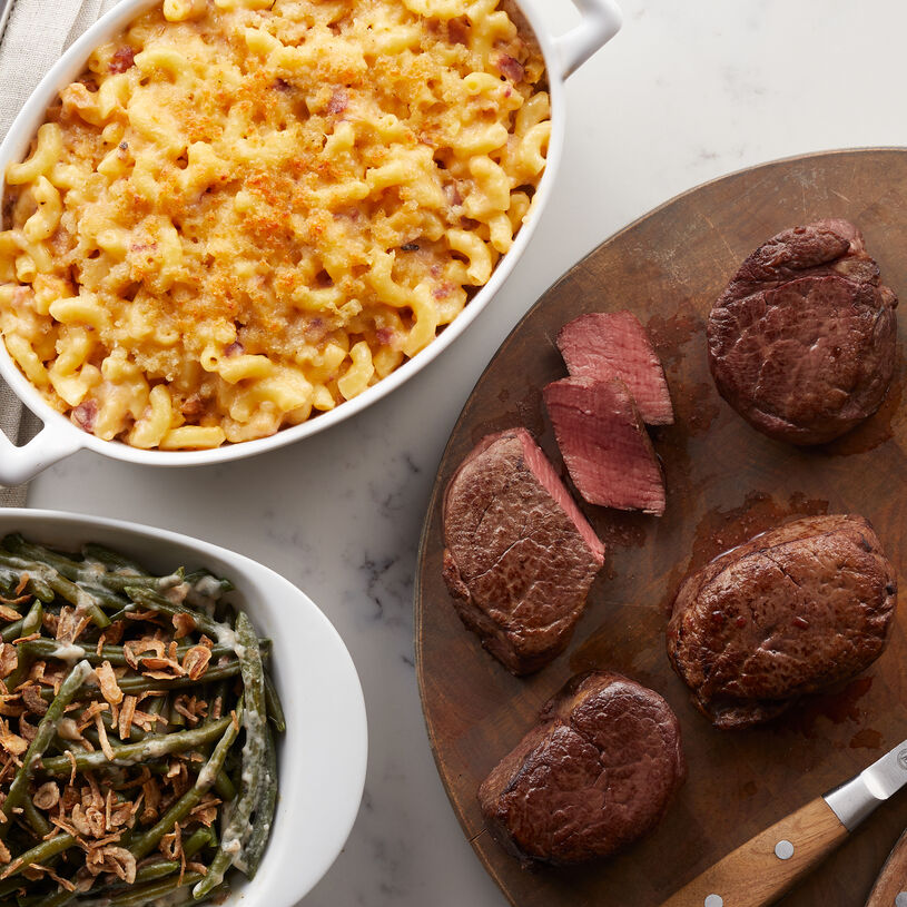This meal features four 6 oz. Filet Mignon, Green Bean Casserole, and creamy Macaroni & Cheese.