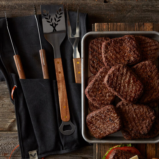 The perfect gift for the burger-loving Dad, this gift set includes twelve of our tender and juicy Prime Burger patties, plus sturdy tools he'll love getting his hands on. Tool Set includes tongs, fork, and spatula with bottle openers.