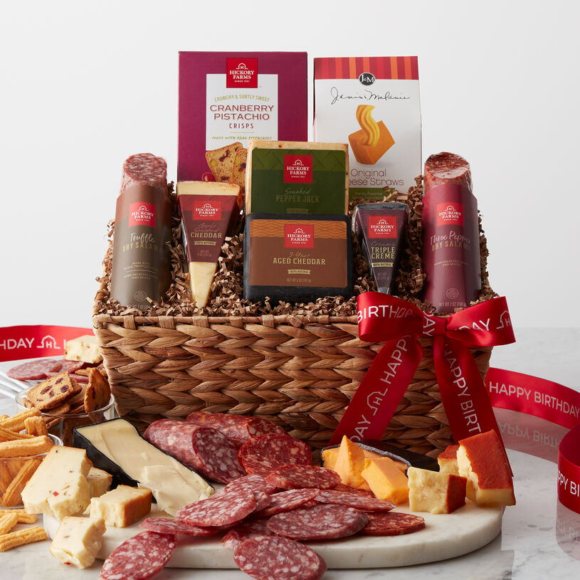 Filled with an assortment of four different creamy, natural cheeses alongside two different flavors of dry salami. Truffle Dry Salami, Three Pepper Dry Salami, Apple Smoked Cheddar, Triple Crème, 3-Year Aged Cheddar, and Smoked Pepper Jack that all pair perfectly for many savory combinations.