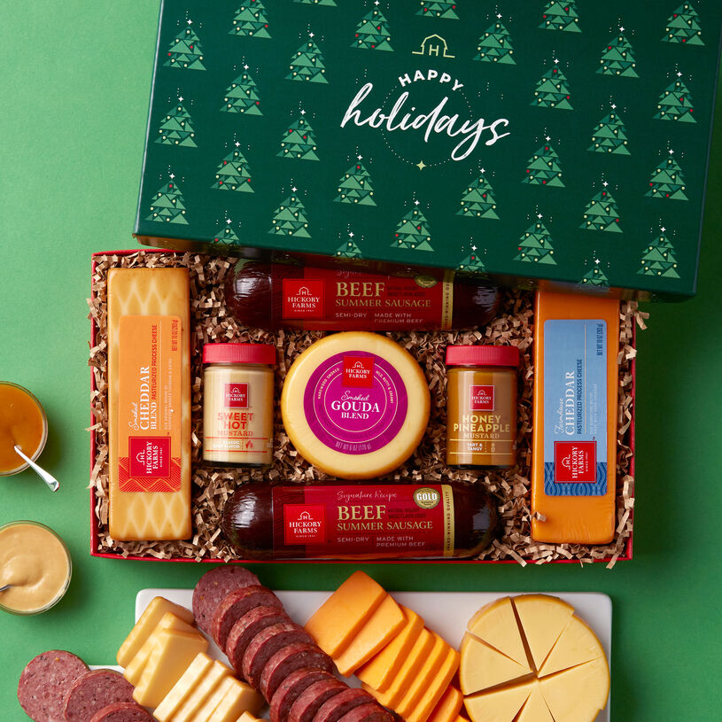 This gift box is filled with beef summer sausage, cheese, mustard, and is topped off with a Happy Holidays lid.