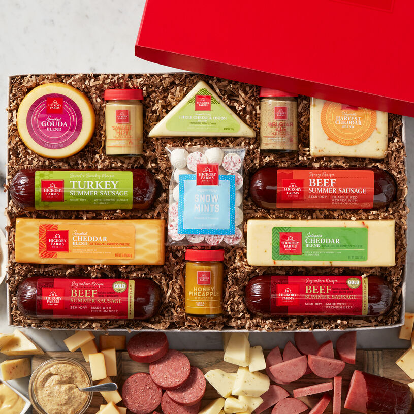 Deluxe smokehouse gift box includes summer sausage, cheese, mints, and mustard