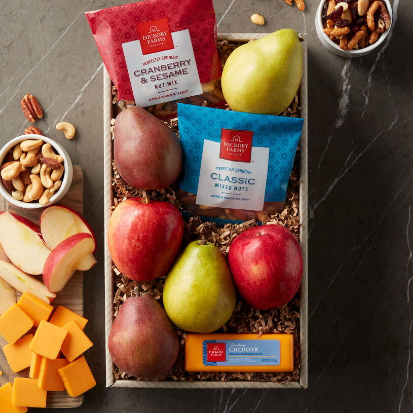 Fruit Snack Assortment includes, cheese, pistachios, mixed nuts, apples, and pears