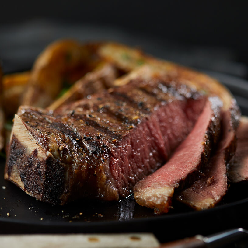 (4) 16 oz Prime Bone-In New York Strip Steaks | Hickory Farms