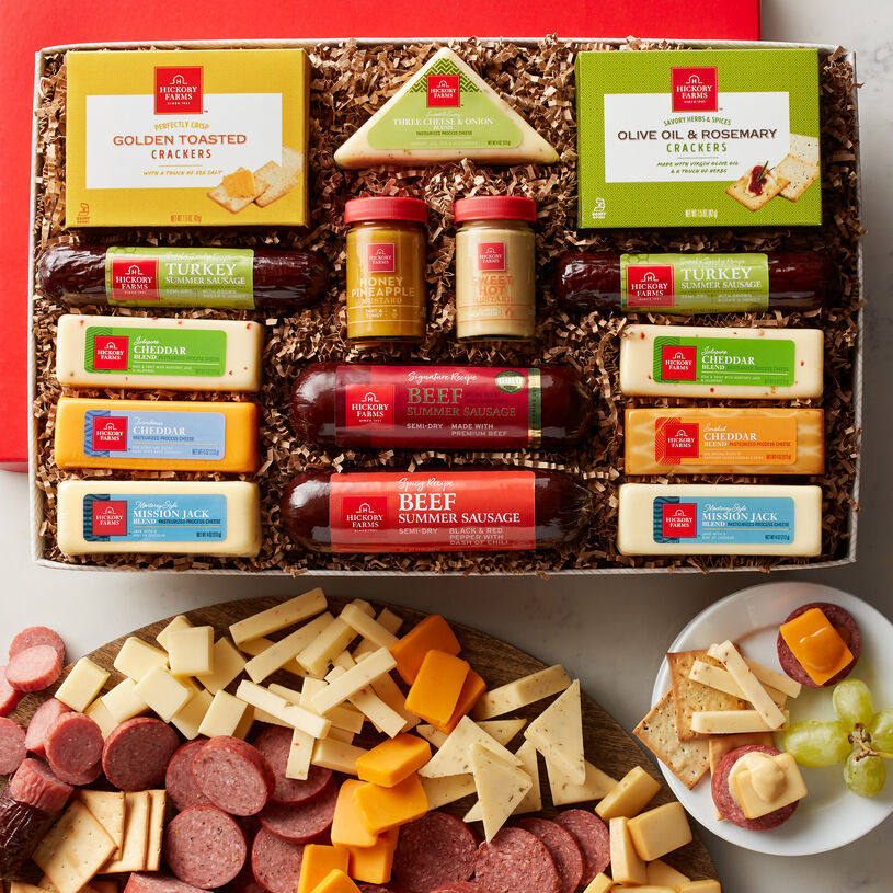 The Hearty Party gift box includes beef summer sausage, turkey summer sausage, mustard, and various cheeses