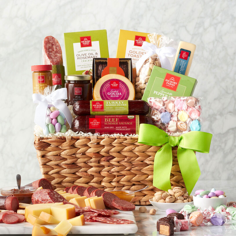 This Deluxe Spring Snack Basket includes beef summer sausage, cheese, crackers, taffy, and Jordan almonds.