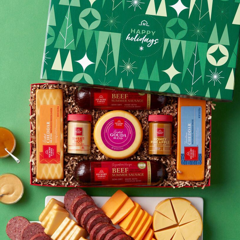 This gift box is filled with beef summer sausage, cheese, mustard, and is topped off with a Happy Holidays lid.