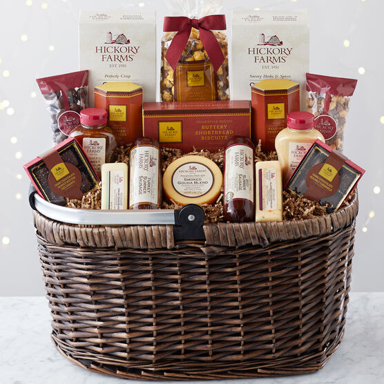 Picnic Basket includes sausage, cheese, mustard, crackers, nuts, chocolates, and more.
