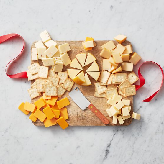 This gift set is filled with five of our gourmet cheeses, a Mango Wood Cheese Board, and Cheese Cleaver