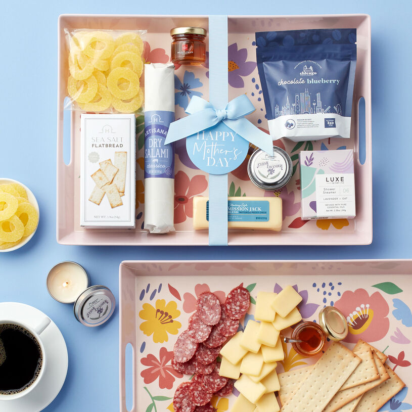This gift for mom includes Classico Dry Salami, Mission Jack Blend, Wildflower Honey, Sea Salt Flatbread, Chocolate Blueberry Coffee, Lavender + Oat Shower Steamer, Lavender candle, and Pineapple Rings.