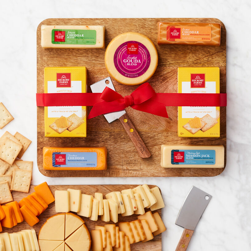 The perfect party snack is a delicious cheese spread, and this gift has everything they'll need to create one, including the board! 