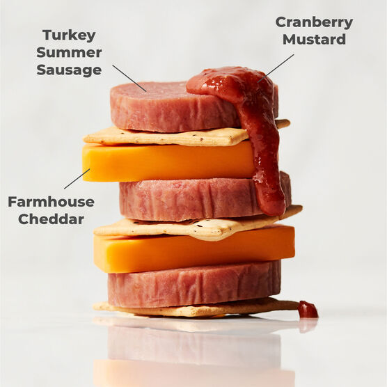 Alternate view of Hickory Farms farmhouse cheddar cheese stacked with top rated summer sausage, smoked cheddar, and sweet hot mustard
