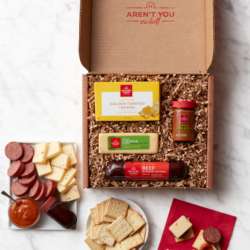 Spicy beef sampler includes spicy & savory beef summer sausage, jalapeno & cheddar cheese, crackers, and mustard