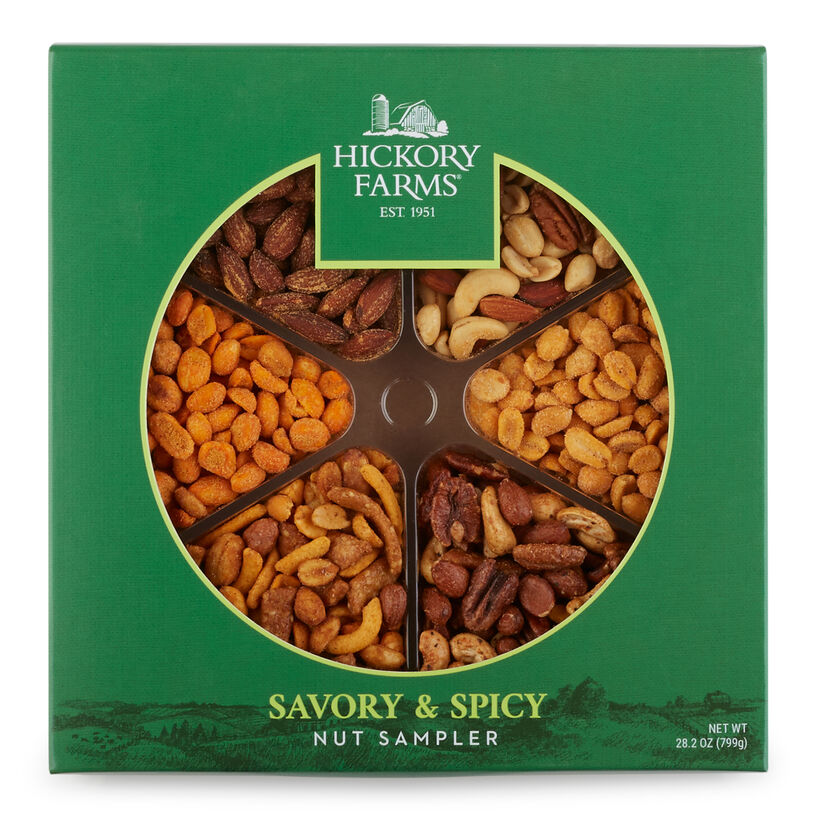 Gift includes BBQ Peanuts, Buffalo Hot Peanuts, Seasoned Nut Mix, Honey Sriracha Almonds, Sweet 'N Spicy Snack Mix, and traditional mixed nuts.