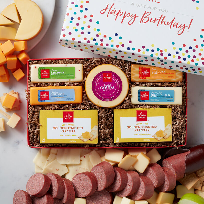This birthday box is filled with our party size Signature Beef Summer Sausage, Smoked Gouda, Smoked Cheddar, Jalapeno & Cheddar Blend, Farmhouse Cheddar, Mission Jack Blend, and Golden Toasted Crackers.