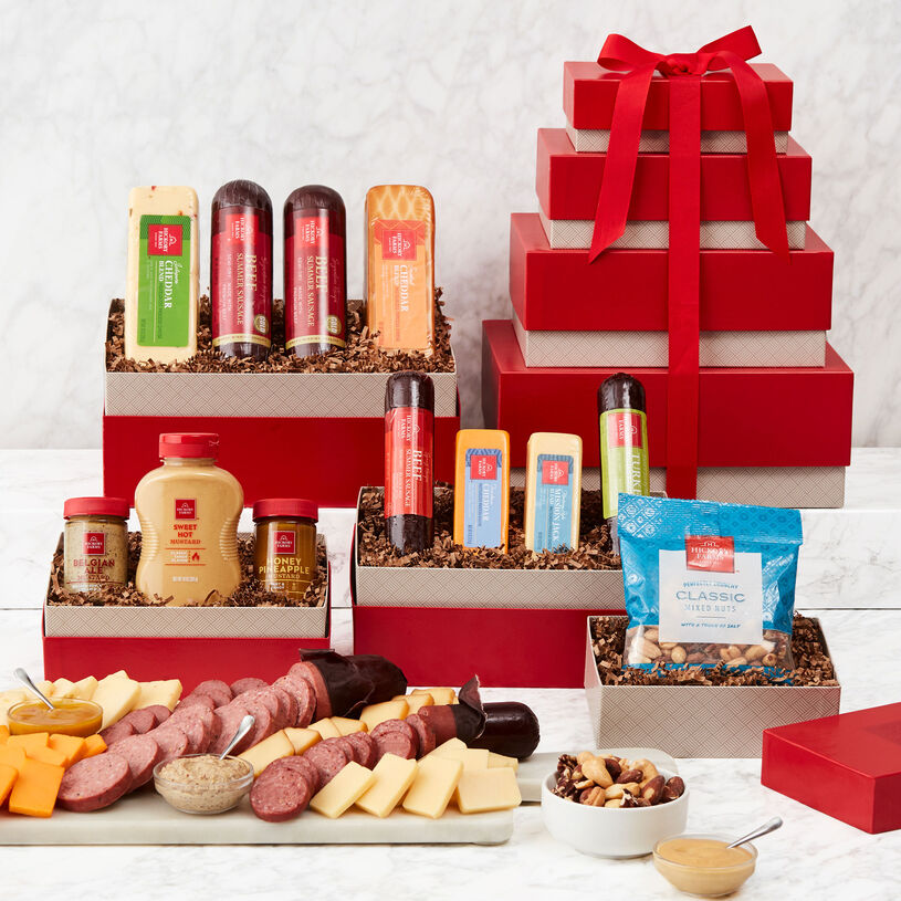 This savory gift tower includes a variety of sausage, cheeses, and mustards.
