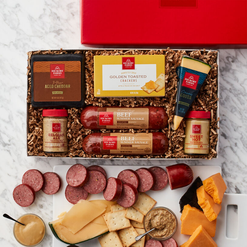 Gift box includes all natural summer sausage, mustard, cheeses, and crackers