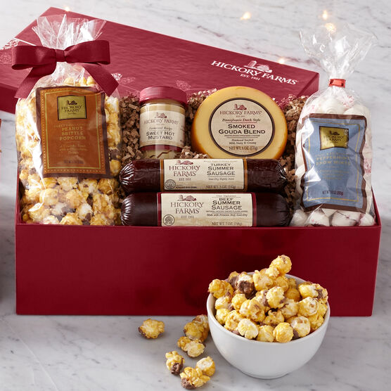 Hickory Farms Holiday Treasure Chest includes summer sausage, cheese, mints, popcorn, and mustard