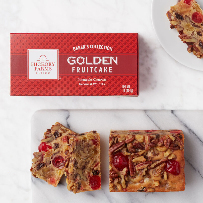 Our fruit cake is packed with sweet candied pineapple, raisins, cherries, and crunchy walnuts and pecans. 