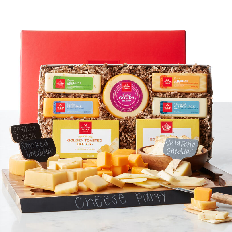 Cheese Party set includes a variety of cheeses and an acacia wood serving set kit
