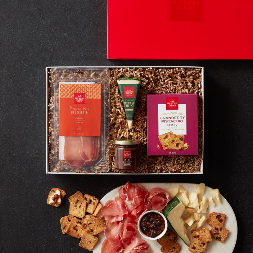 It features our Premium Pork Prosciutto, Menage Cheese, Fig Chutney, and Cranberry Pistachio Crisps to stack up perfectly full-flavored bites. 