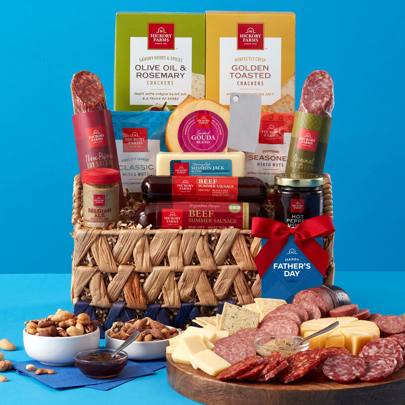 Father's Day basket with two Summer Sausages, Original and Three Pepper Dry Salami, various cheeses, Belgian Ale Mustard, Hot Pepper Bacon Jam, crackers, mixed nuts, and a cheese cleaver