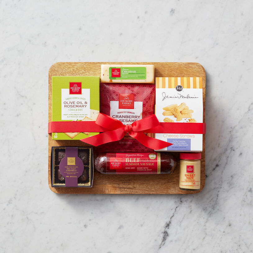 Our well-loved flavors come presented on a cheese board, perfect for creating a delicious charcuterie spread! 