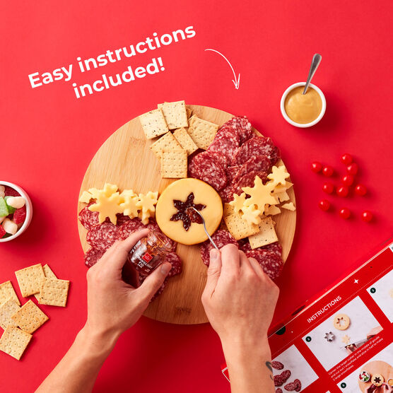 Holiday Wreath Charcuterie Board Kit meat and cheese sliced and arranged on board