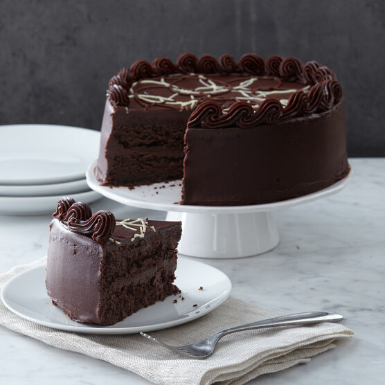 The Premium Holiday Dinner includes an Intense Chocolate Fudge Layer Cake for dessert