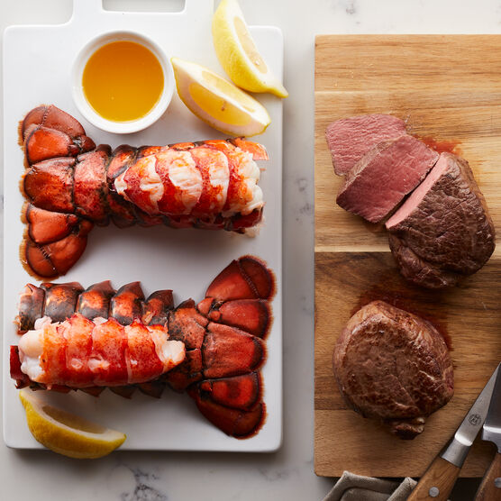 Alternate View of Perfectly tender Filet Mignon steaks are matched with our sweet, succulent lobster tails. Our Surf & Turf is a delicious choice for a special meal. 