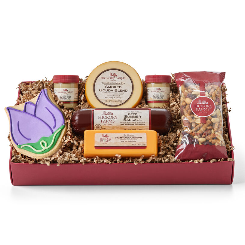 Spring Assortment includes summer sausage, cheese, nut mix, mustard, and a tulip cookie