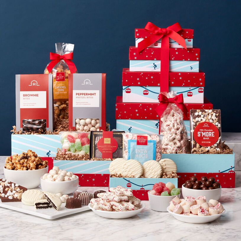 This winter gift tower features four specially-designed boxes filled with deliciously sweets!