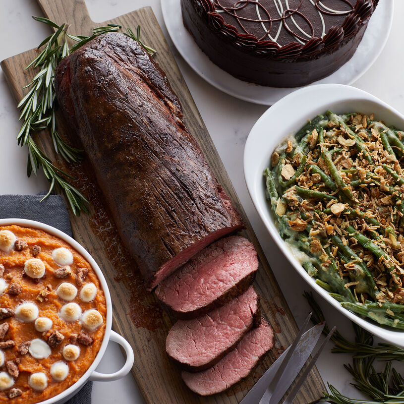 This comes with our famous Beef Tenderloin for Chateaubriand, Brown Sugar Sweet Potatoes, Green Bean Casserole, and an Intense Chocolate Fudge Layer Cake for dessert.