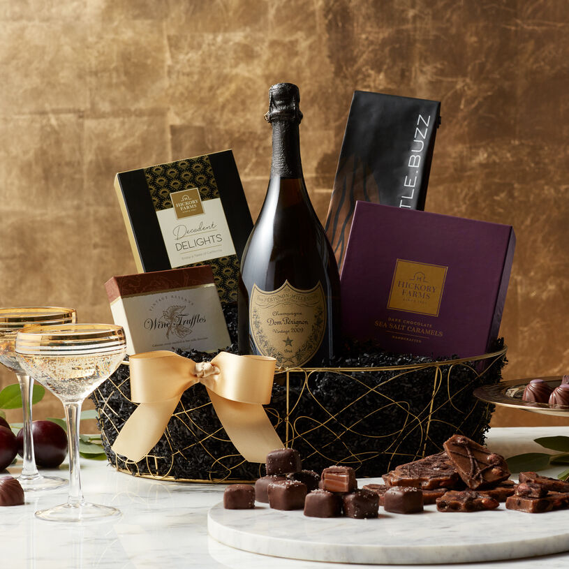 This champagne gift basket features the acclaimed Dom Perignon Champagne 2009 Brut and is filled with decadent chocolate treats.