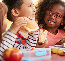 Signature Give Back Gift Box containing sausage, cheese and nuts.