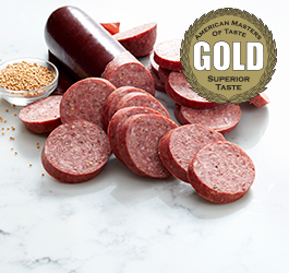 Signature Give Back Gift Box containing sausage, cheese and nuts.