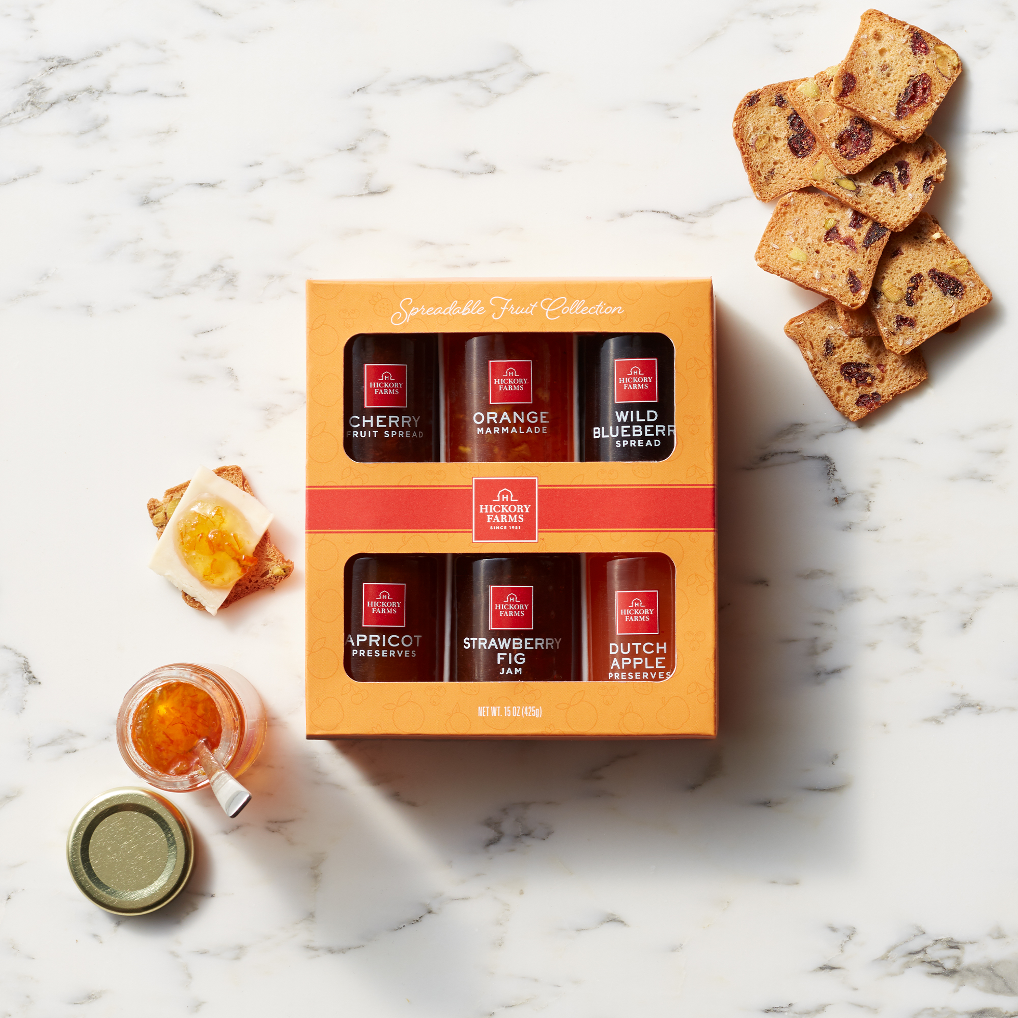 Cherry Fruit Spread, Orange Marmalade, Wild Blueberry Spread, Apricot Preserves, Strawberry Fig Jam, and Dutch Apple Preserves.