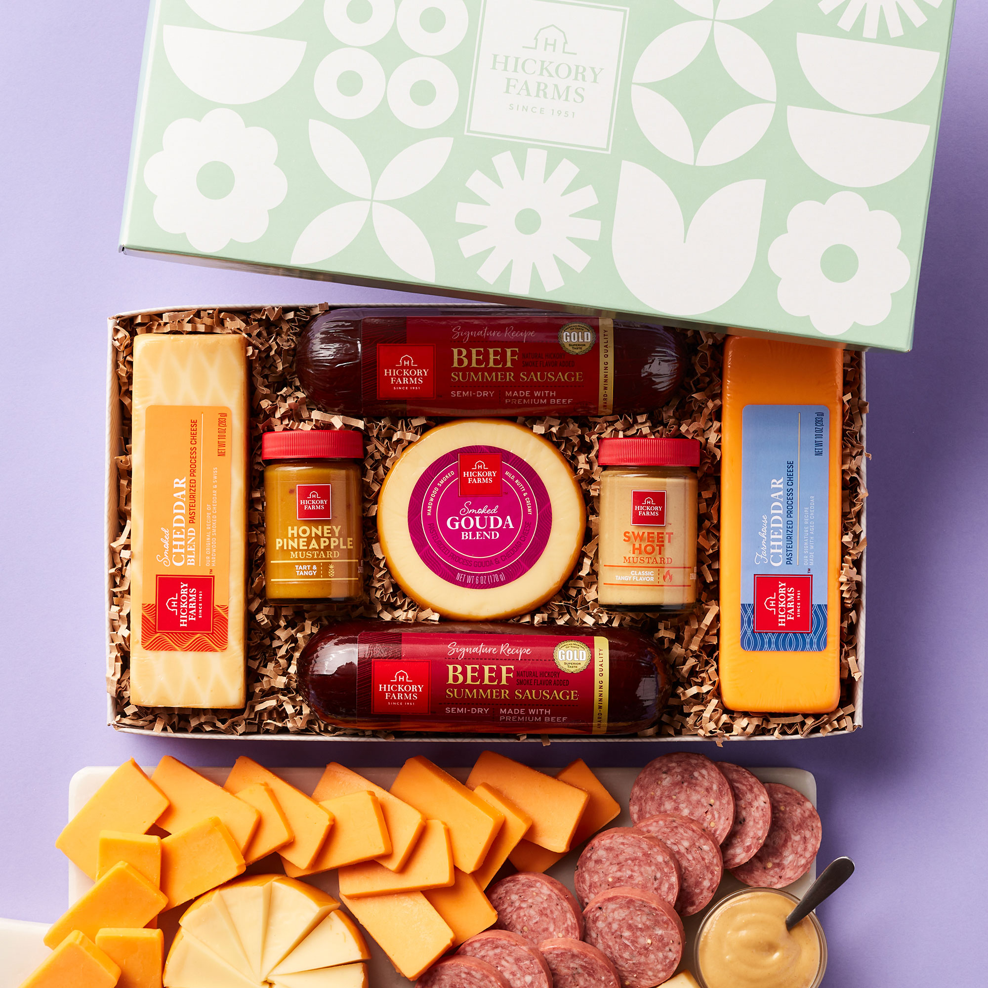 https://www.hickoryfarms.com/on/demandware.static/-/Sites-Web-Master-Catalog/default/dw073d1504/images/products/sunny-summer-sausage-cheese-gift-box-001278-1.jpg