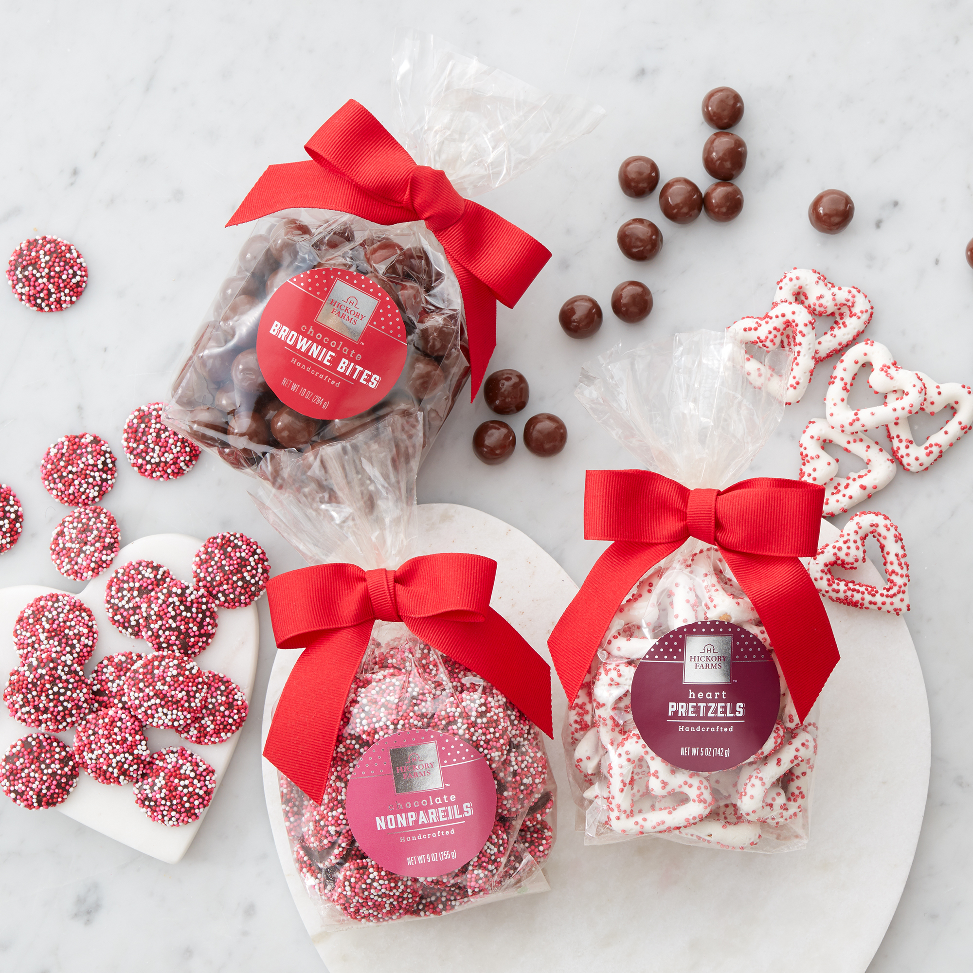 Flight includes chocolate nonpareils, brownie bites, and heart shaped pretzels