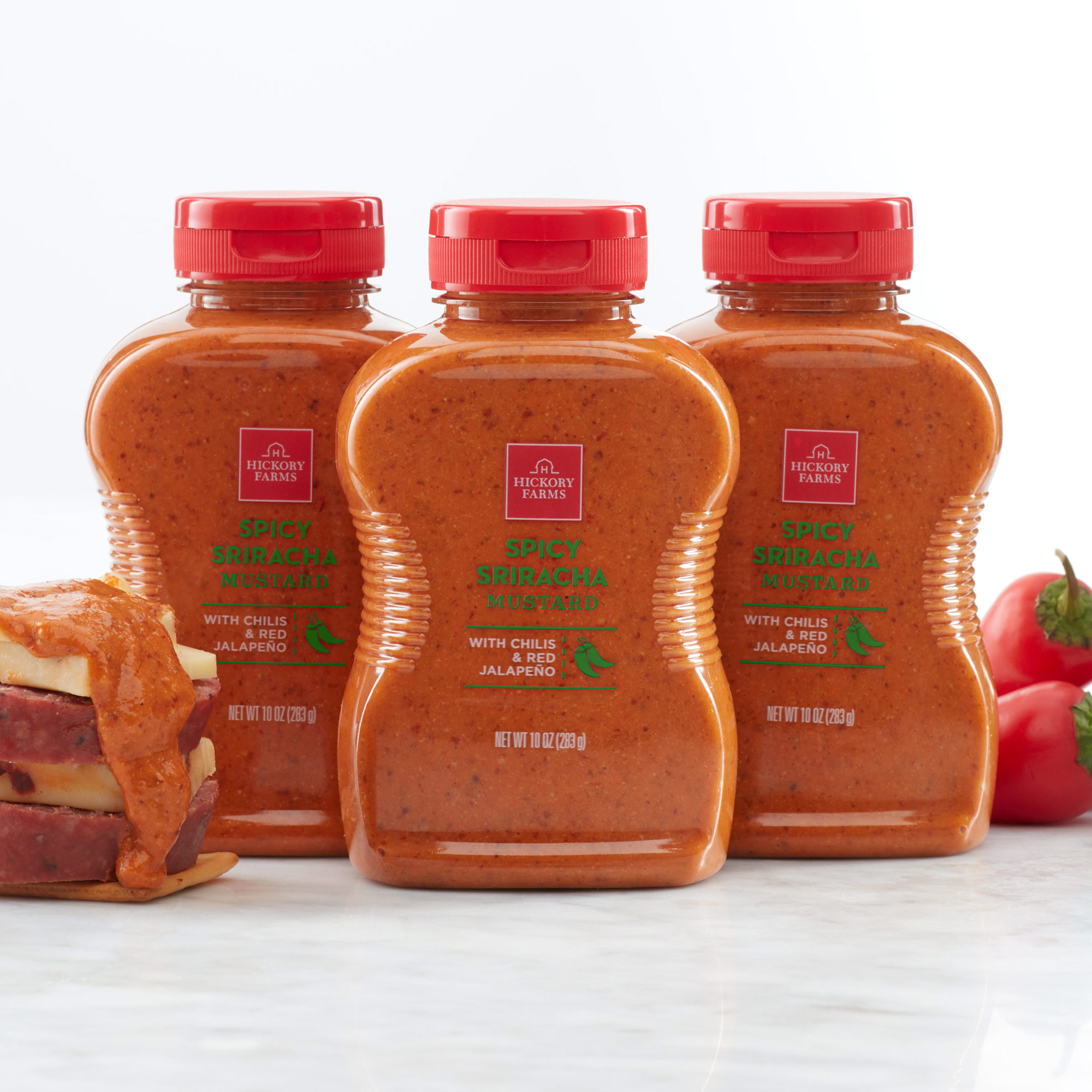 Our Spicy Sriracha Mustard is an expertly crafted blend of tangy mustard and spicy, smoky chilis that&rsquo;s perfect for pairing with your favorite cheeses and sausage for a snack that&rsquo;s anything but boring.