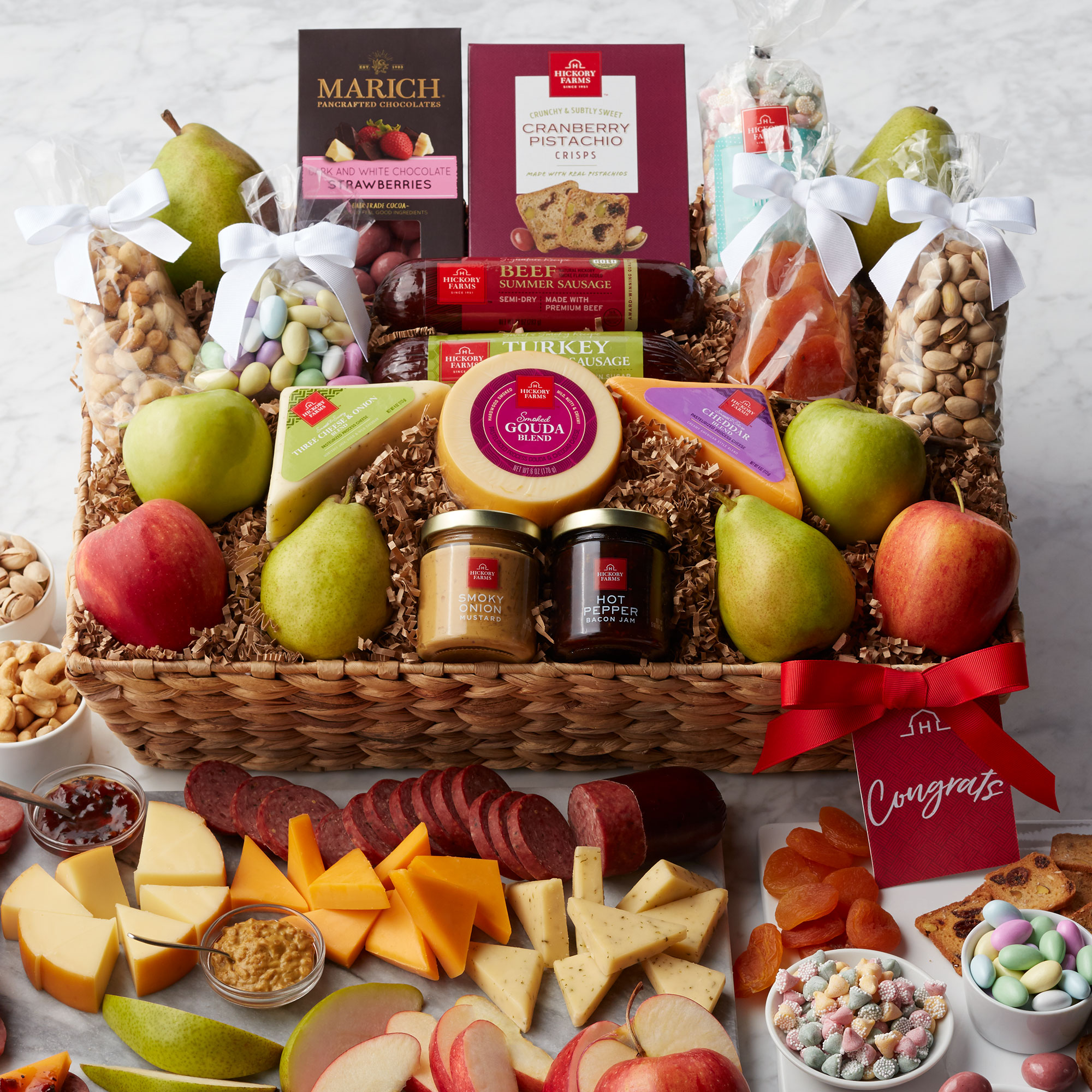 Say "congratulations" deliciously with this bountiful basket filled with sweet and savory treats!