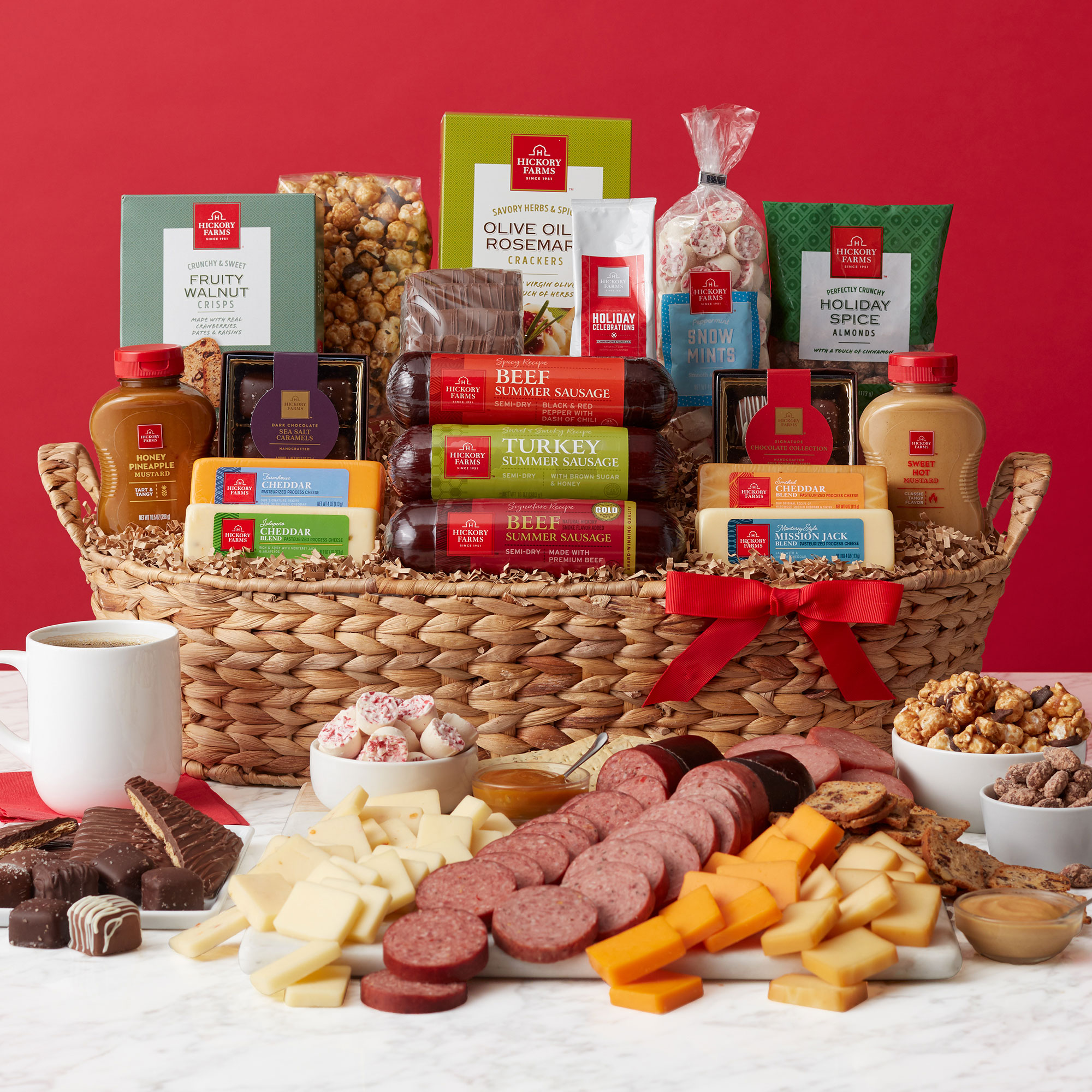https://www.hickoryfarms.com/on/demandware.static/-/Sites-Web-Master-Catalog/default/dw4004508c/images/products/grand-holiday-gift-basket-new-014227-1.jpg